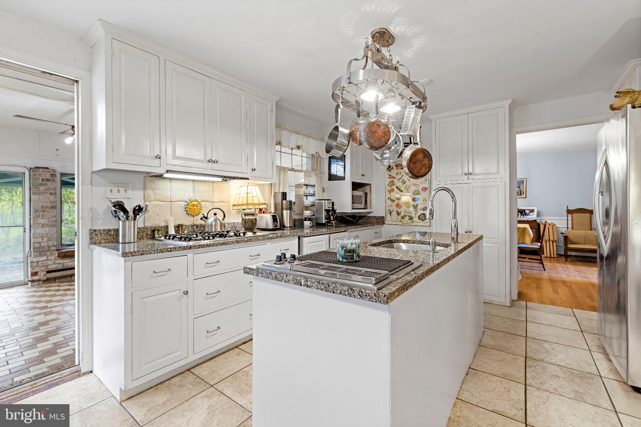 2114 Pot Spring Road Lutherville-Timonium, MD 21093 - Photo 13 of 49 Island, tons of cabinets, tiled floor