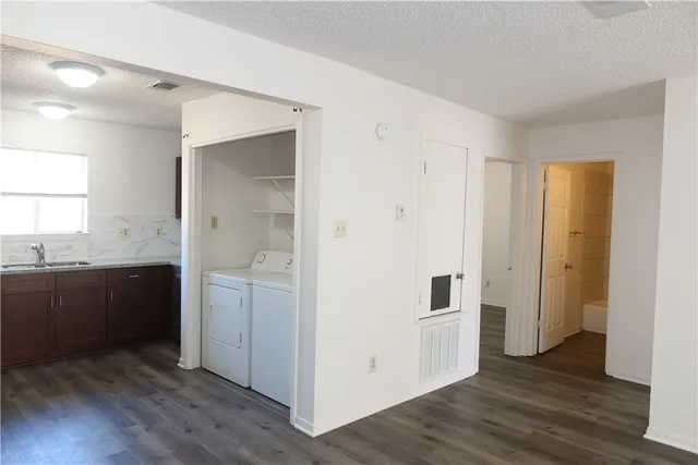 a view of kitchen with wooden floor