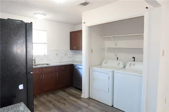 a view of bathroom with dual sinks