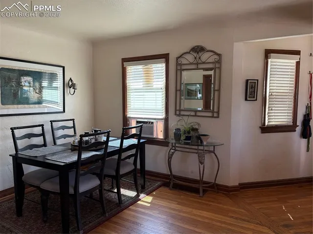 a view of a livingroom with furniture and window
