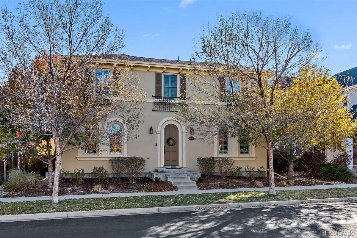 3436 Willow Street Denver, CO 80238 - Photo 1 of 37 a front view of a house with garden
