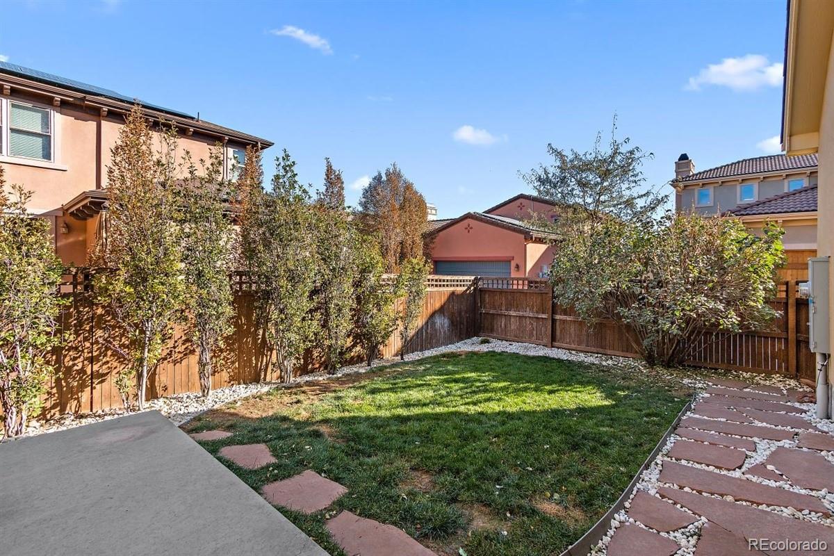 3436 Willow Street Denver, CO 80238 - Photo 34 of 37 a view of a back yard of the house