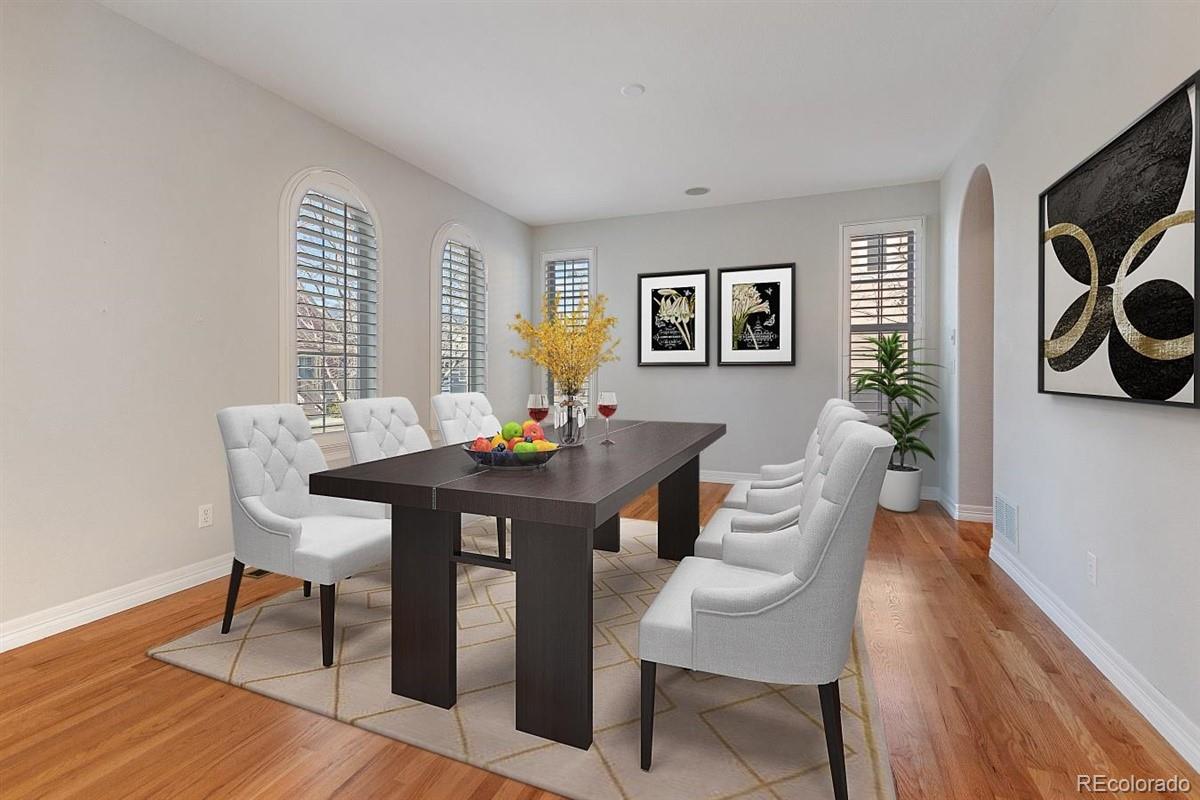 3436 Willow Street Denver, CO 80238 - Photo 8 of 37 a view of a dining room with furniture and wooden floor