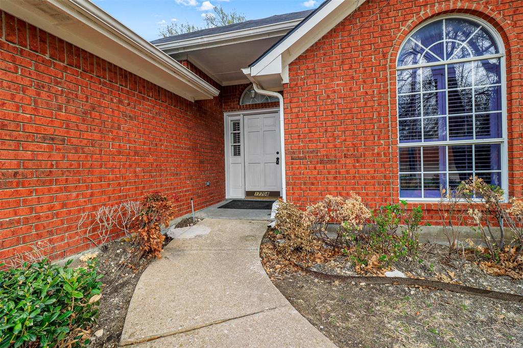 17708 Hillcrest Road Dallas, TX 75252 - Photo 2 of 27 a front view of a house