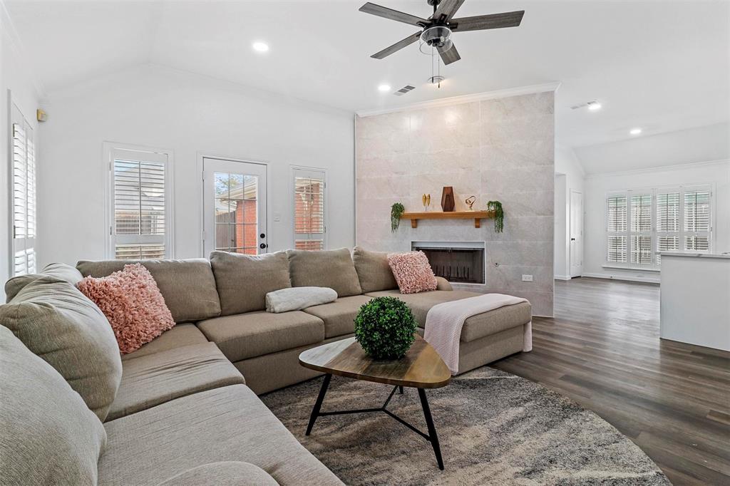 17708 Hillcrest Road Dallas, TX 75252 - Photo 4 of 27 a living room with furniture and a wooden floor