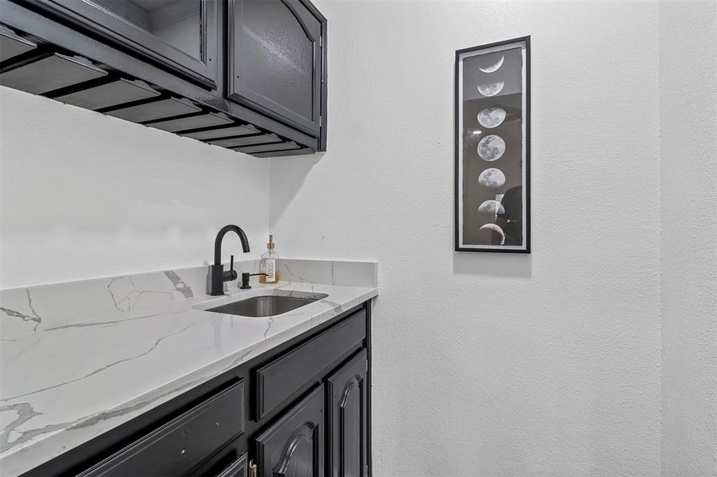 17708 Hillcrest Road Dallas, TX 75252 - Photo 5 of 27 a close view of sink and tap