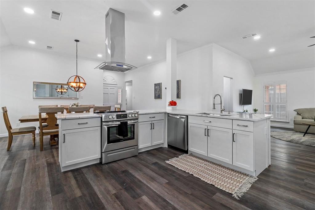 17708 Hillcrest Road Dallas, TX 75252 - Photo 27 of 27 a kitchen with a white wooden cabinets and white appliances