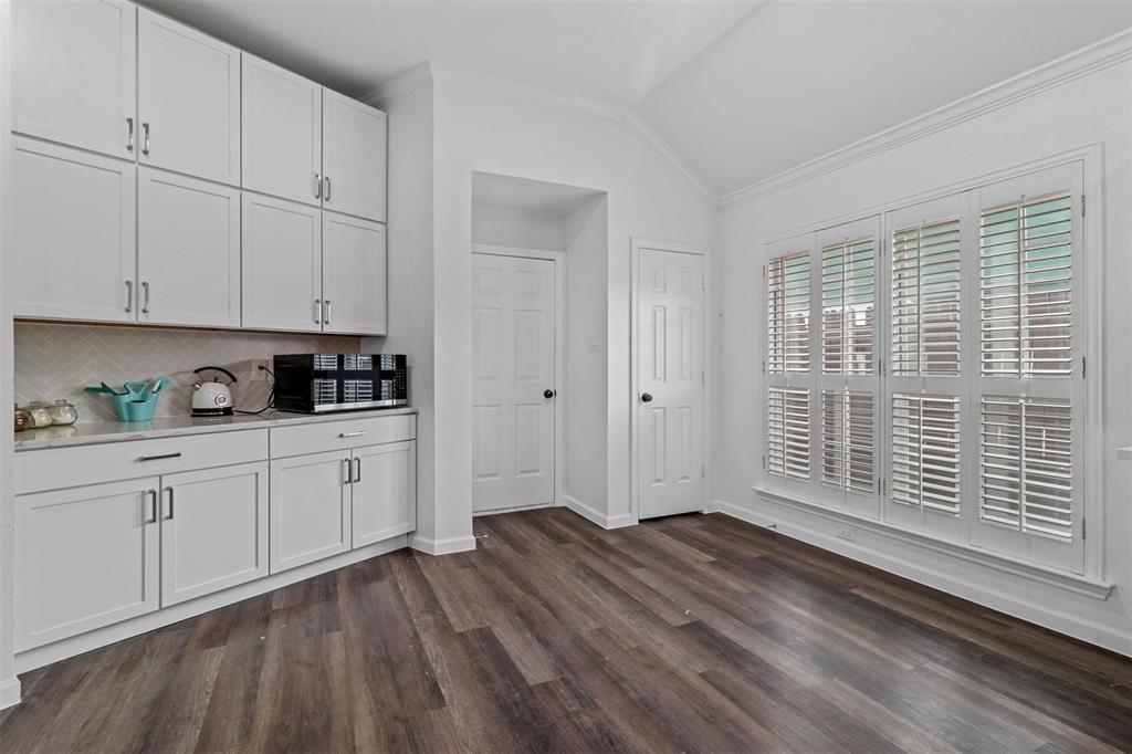 17708 Hillcrest Road Dallas, TX 75252 - Photo 9 of 27 a view of kitchen with granite countertop cabinets a sink and dishwasher