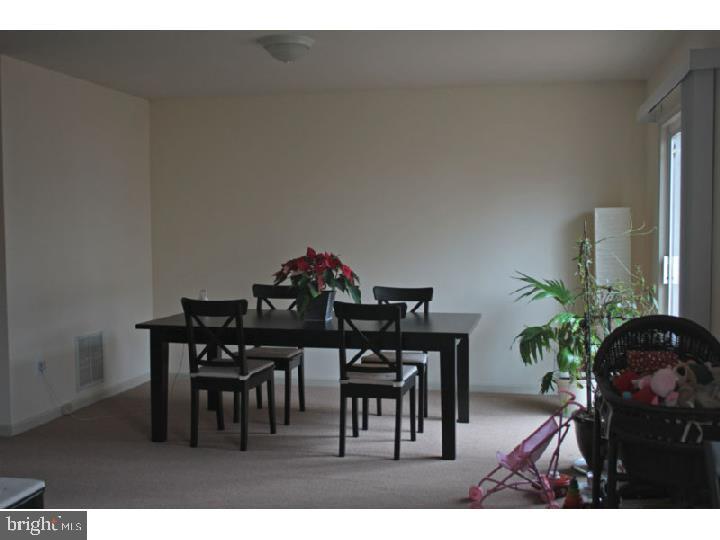 2 Lexington Court Princeton, NJ 08540 - Photo 3 of 7 a view of a dining room with furniture and wooden floor
