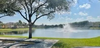 a view of a lake from a yard