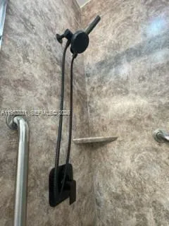 a close view of a shower in a bathroom