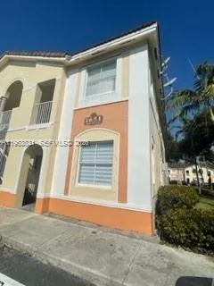 a view of a house with a street