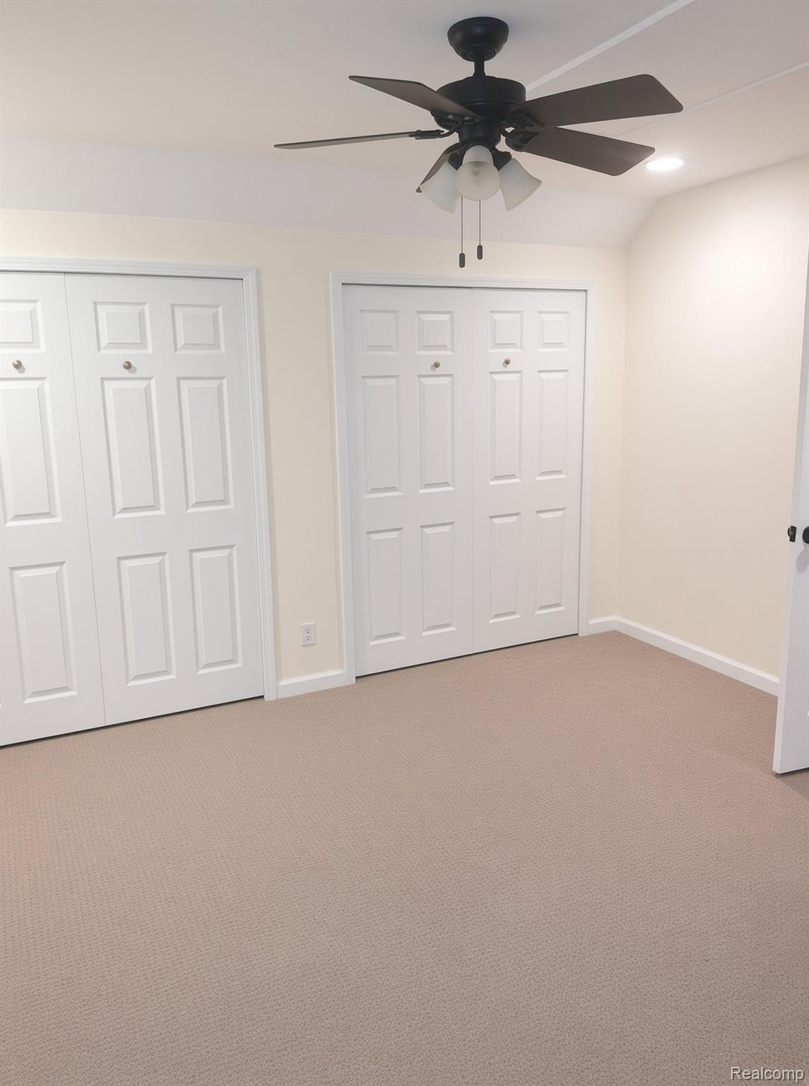8922 Stone Road Algonac, MI 48001 - Photo 13 of 15 Neutral-toned carpeting with ample closet storage, an overhead ceiling fan, and recessed lighting