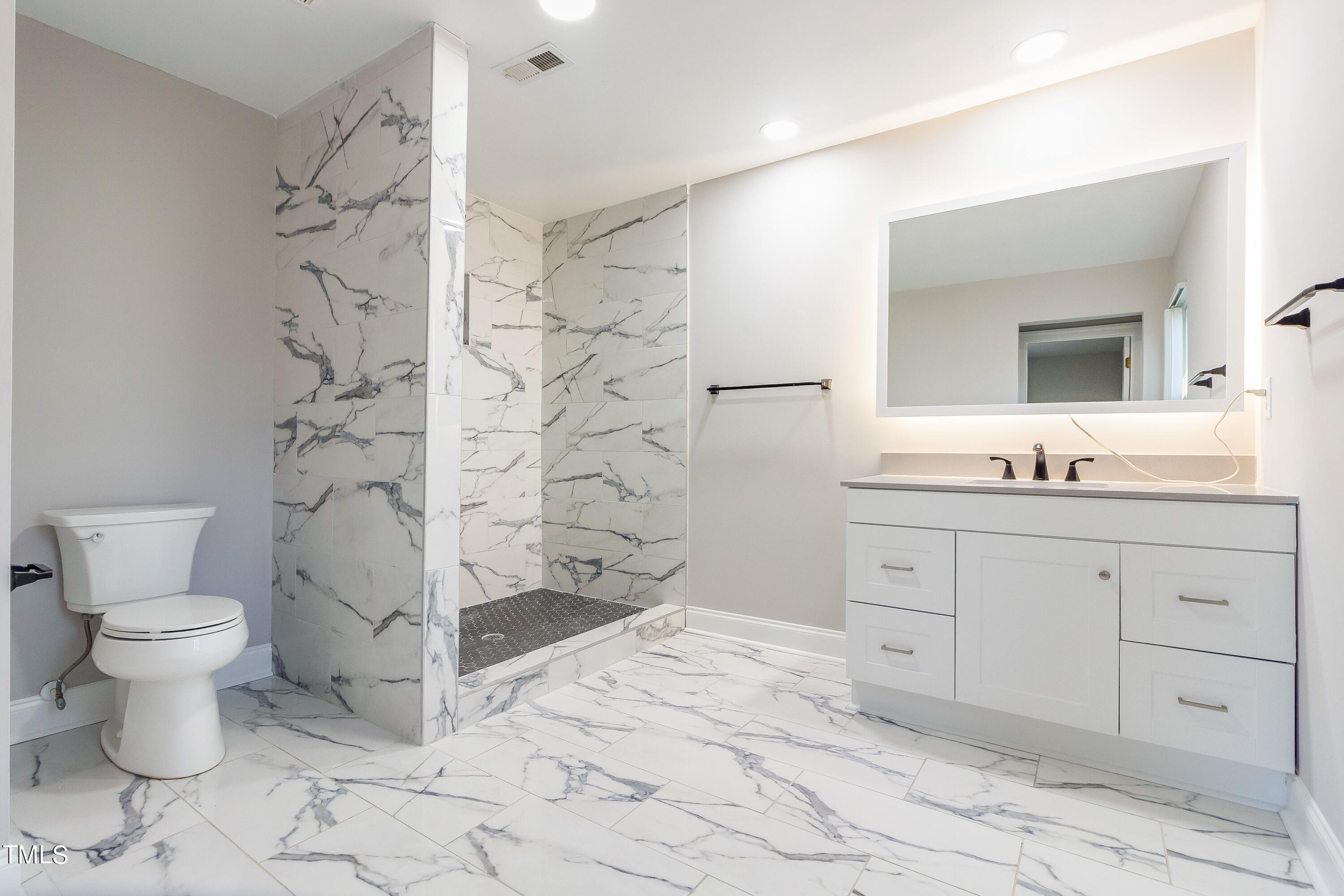 1617 Cameron Drive Wake Forest, NC 27587 - Photo 15 of 21 a bathroom with a granite countertop sink toilet and shower