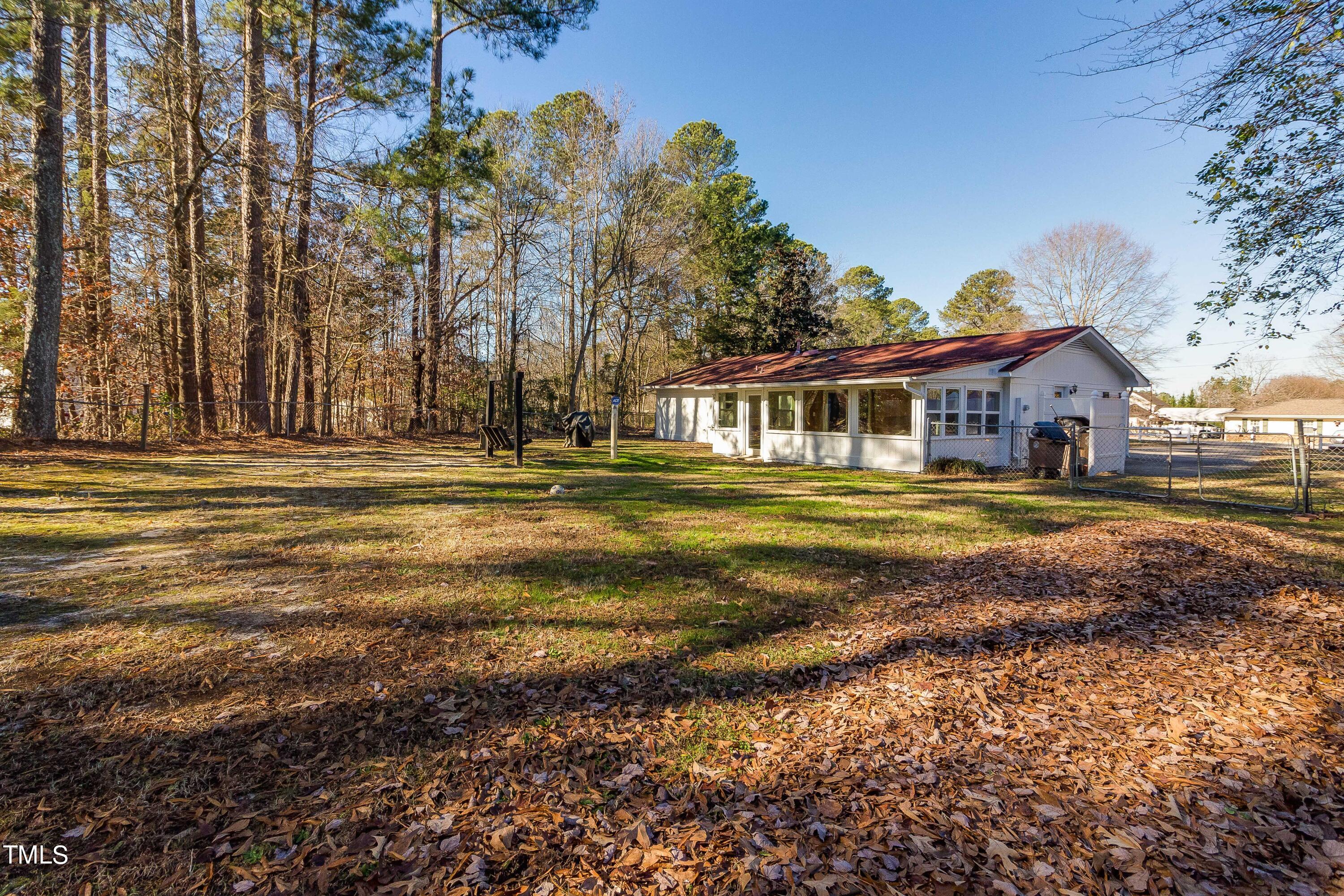 1617 Cameron Drive Wake Forest, NC 27587 - Photo 19 of 21 a view of a house with a big yard and large trees