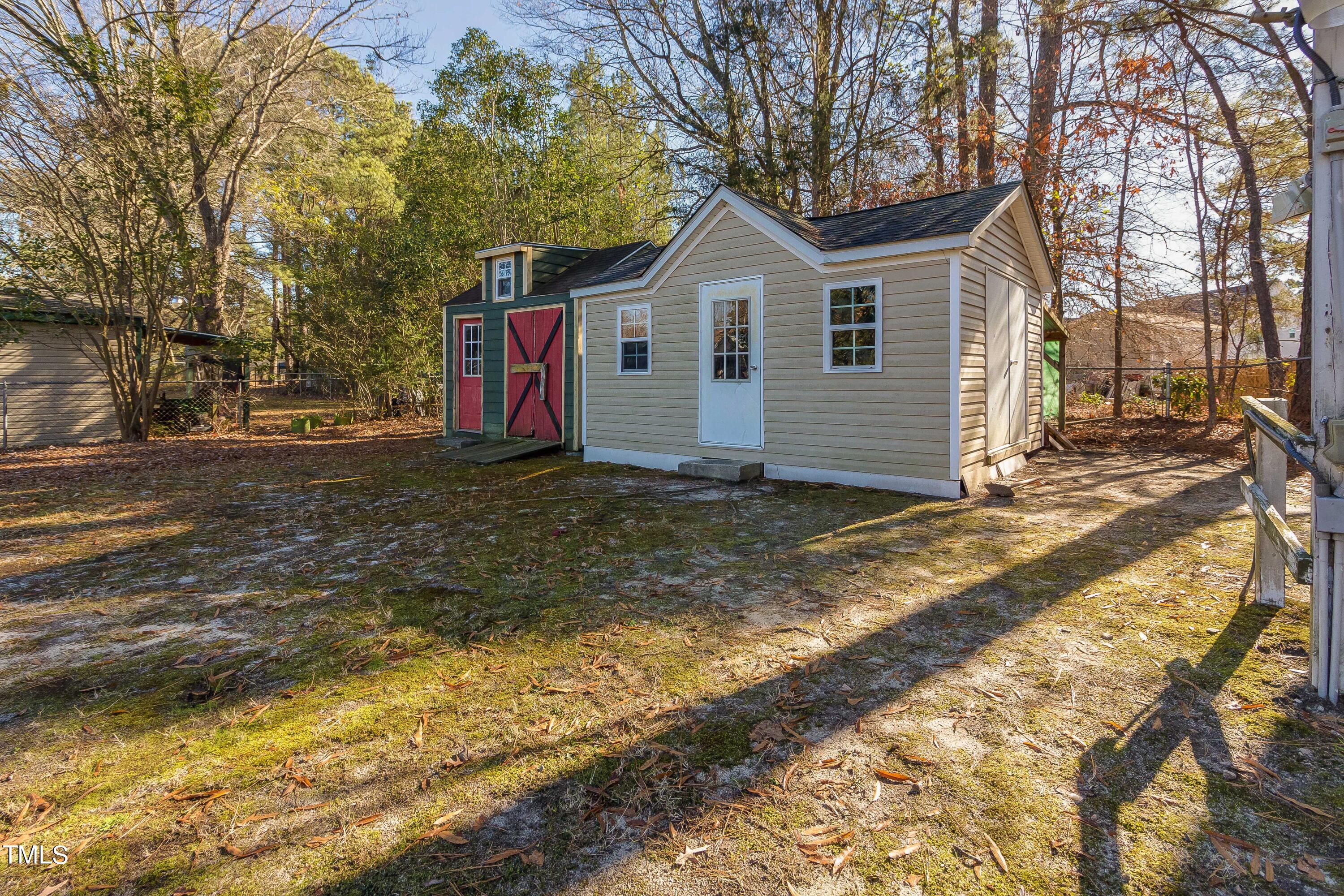 1617 Cameron Drive Wake Forest, NC 27587 - Photo 21 of 21 a view of a house with a yard covered in snow