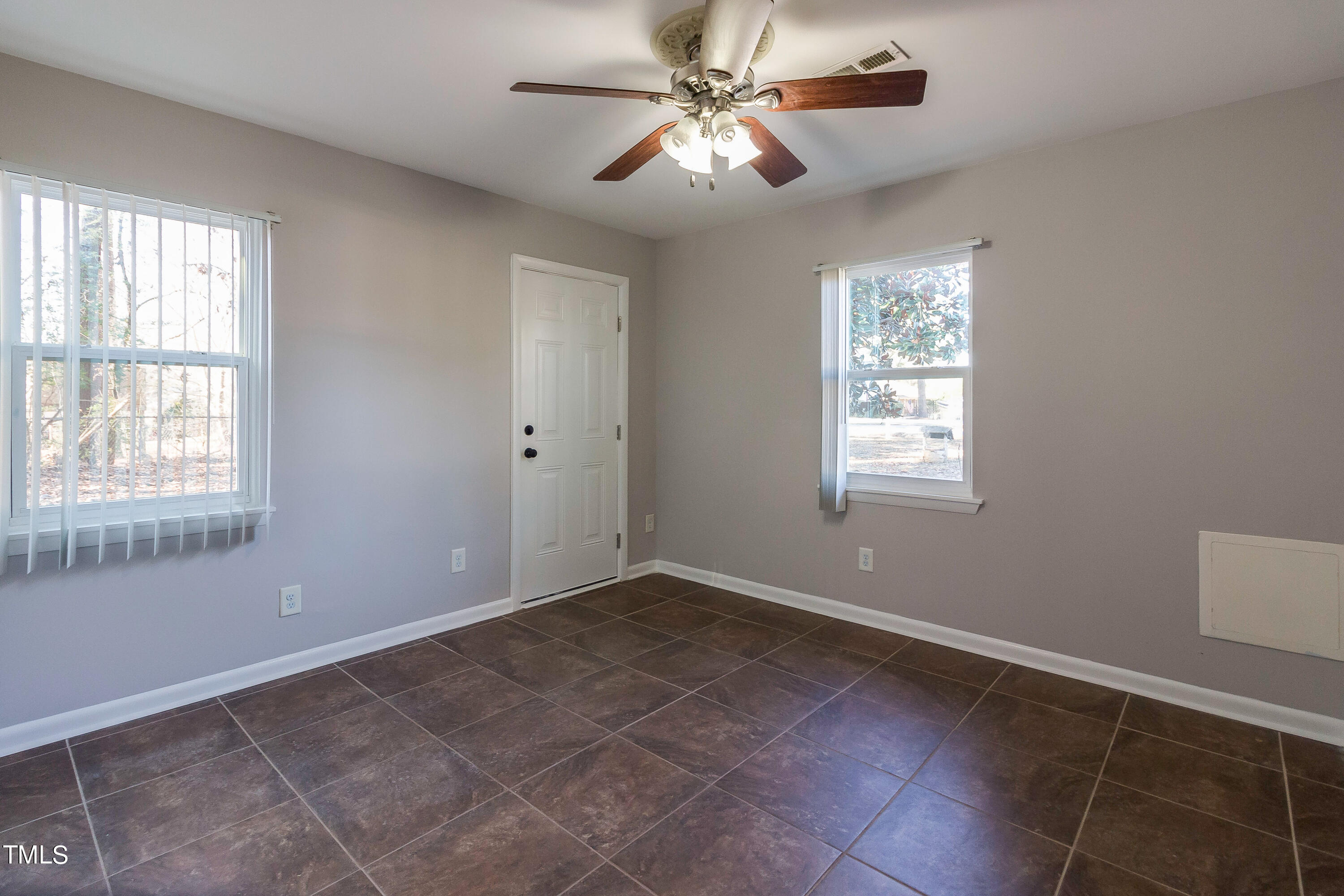 1617 Cameron Drive Wake Forest, NC 27587 - Photo 7 of 21 a view of an empty room with a window