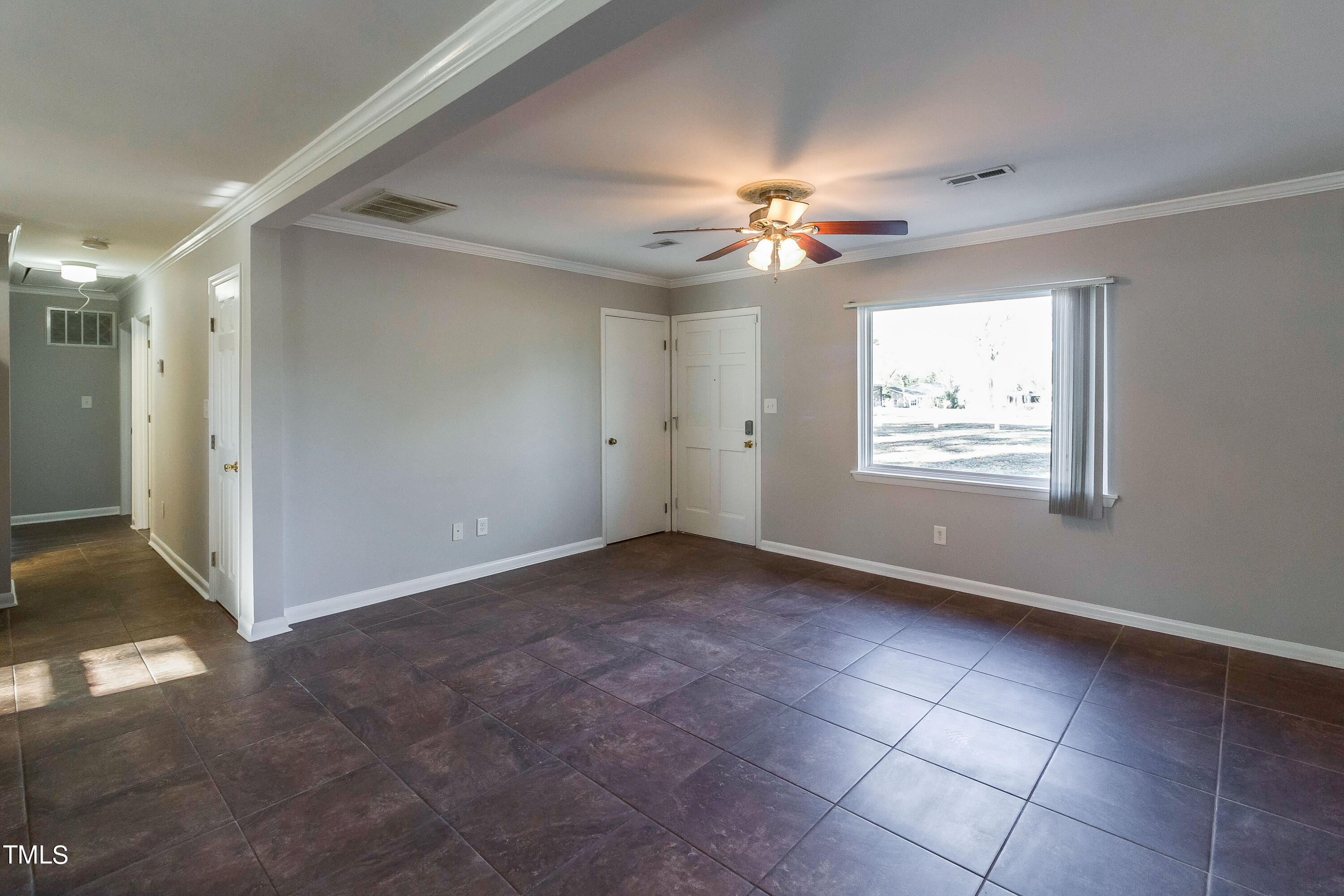 1617 Cameron Drive Wake Forest, NC 27587 - Photo 8 of 21 a view of an empty room with a window
