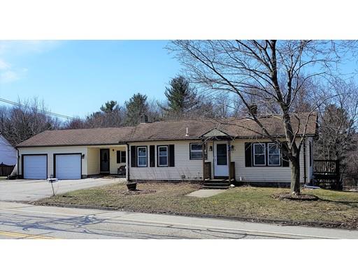 59 Cudworth Road Webster, MA 01570 - Photo 2 of 12 a front view of a house with a yard