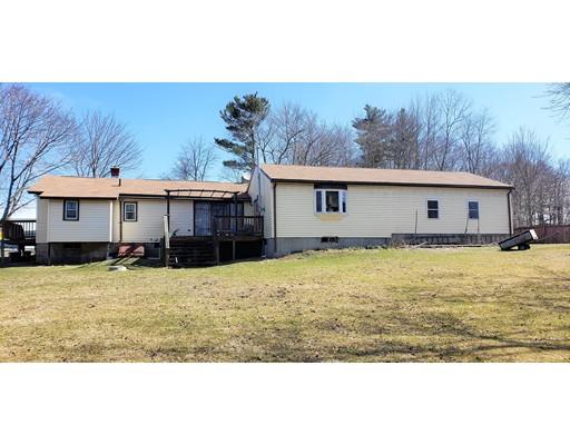59 Cudworth Road Webster, MA 01570 - Photo 3 of 12 a front view of a house with a yard