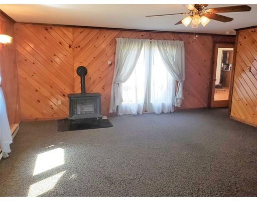 59 Cudworth Road Webster, MA 01570 - Photo 4 of 12 a view of empty room with a fireplace