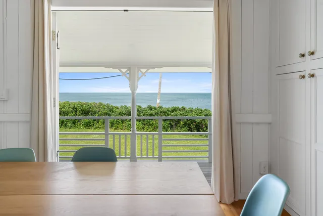 a view of a small yard and a large window