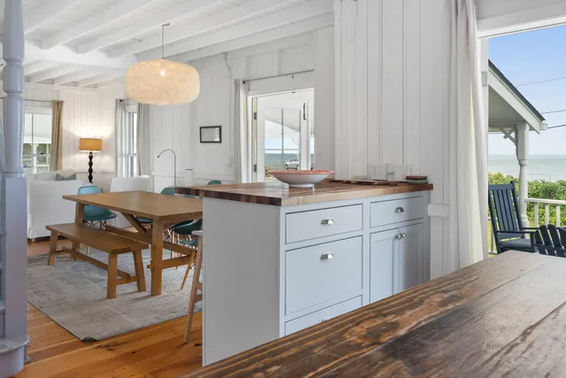a view of a kitchen from a dining room
