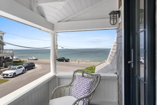 a room with furniture and a rug