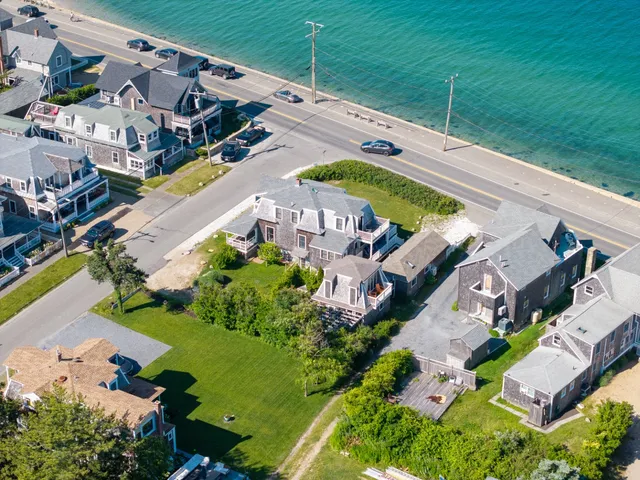 an aerial view of a house with a garden