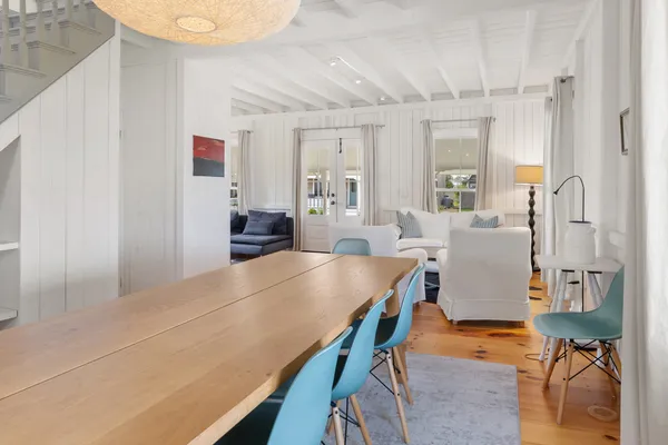 a living room with furniture and a table