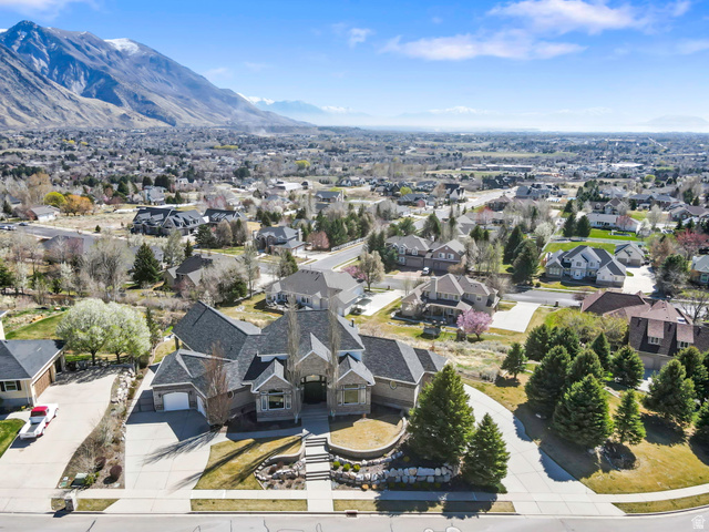 684 North Summit Way Alpine, UT 84004 - Photo 8 of 58 Aerial perspective of suburban area with a mountainous background