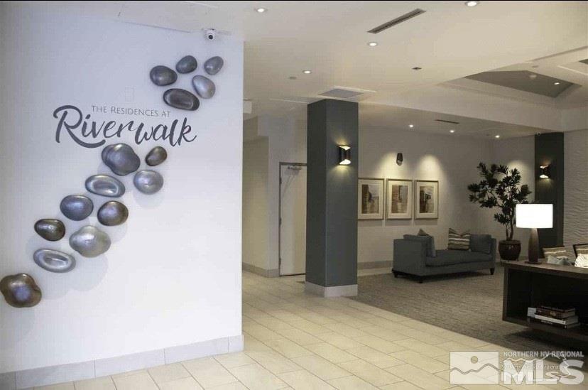 200 West 2nd Street, Unit 1502 Reno, NV 89501 - Photo 5 of 29 a lobby with furniture and wooden floor