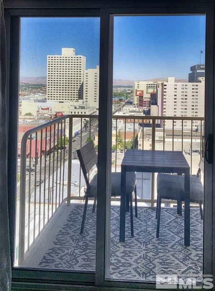 200 West 2nd Street, Unit 1502 Reno, NV 89501 - Photo 7 of 29 a view of a balcony with chairs