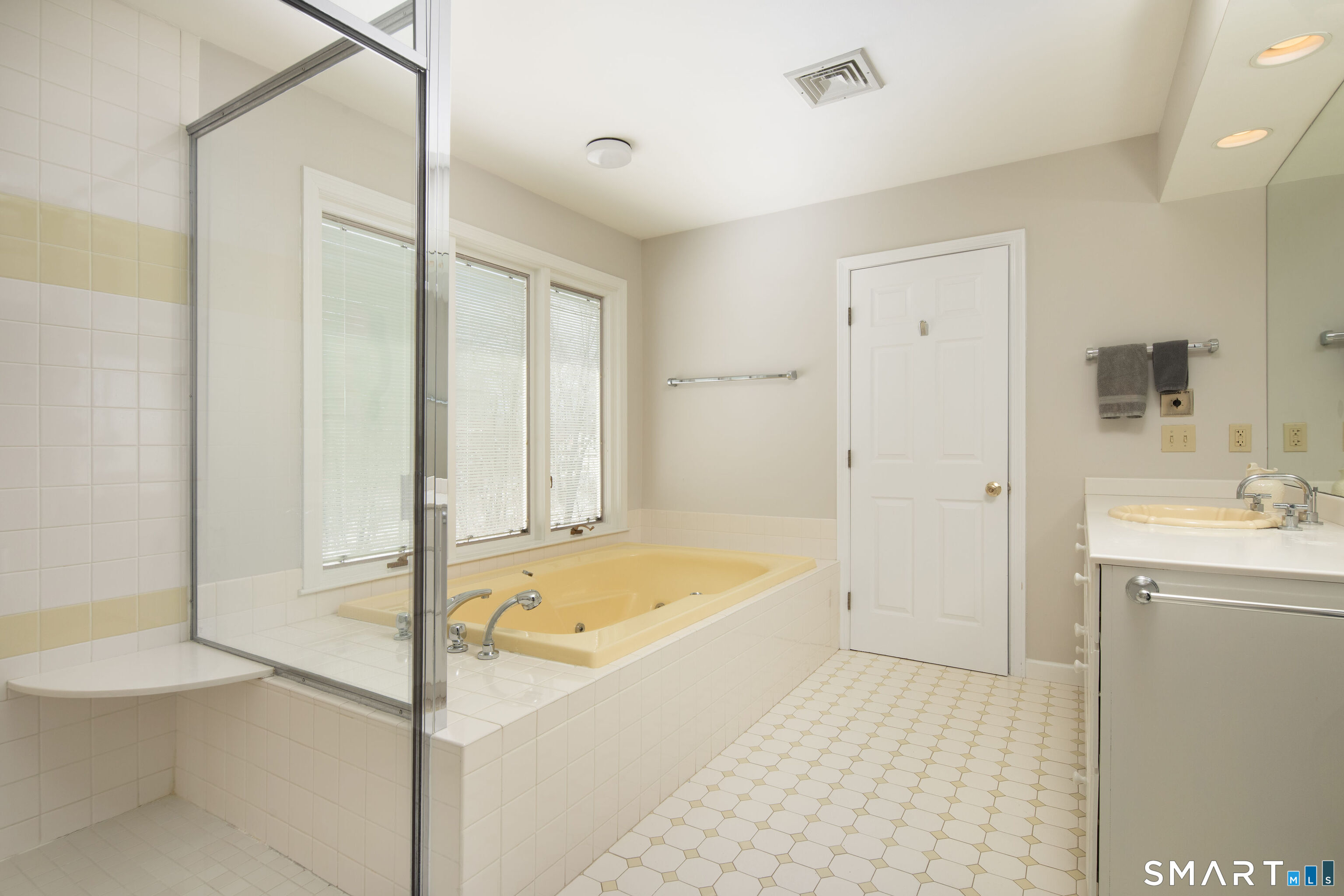 59 Cornwall Bridge Road Sharon, CT 06069 - Photo 15 of 26 a bathroom with a tub shower sink vanity and a toilet