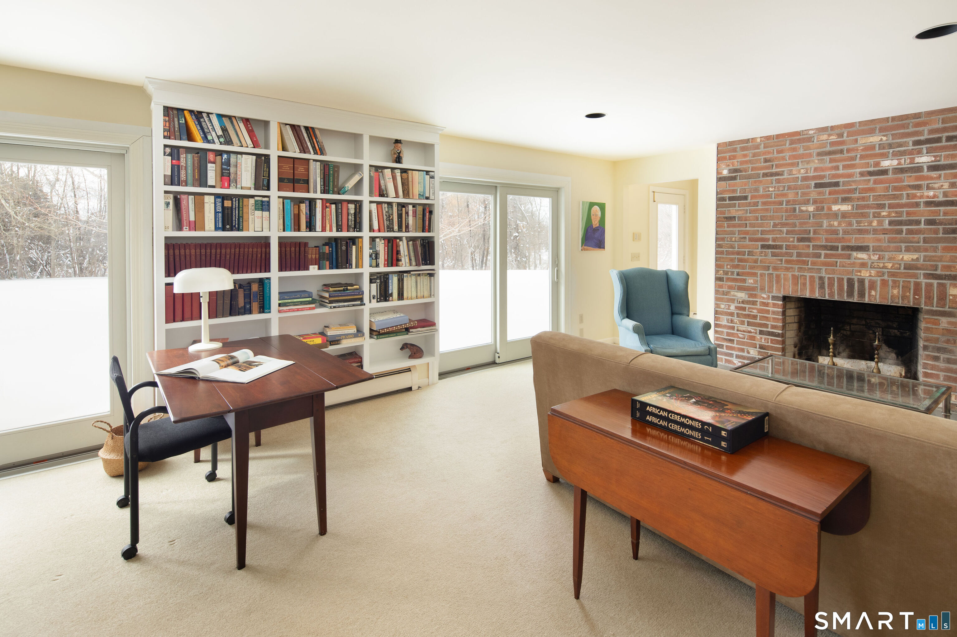 59 Cornwall Bridge Road Sharon, CT 06069 - Photo 18 of 26 a living room with furniture and a fireplace