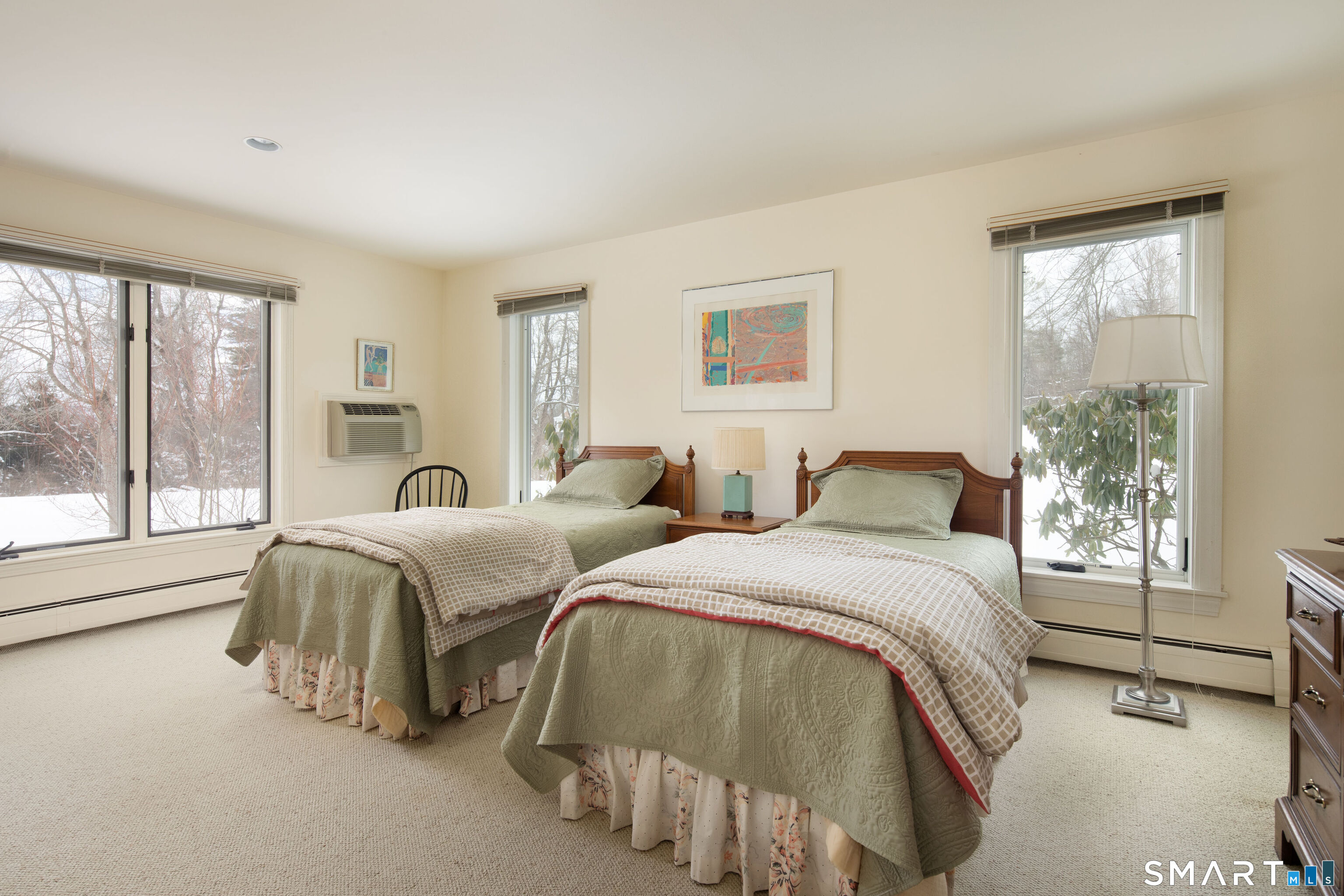 59 Cornwall Bridge Road Sharon, CT 06069 - Photo 19 of 26 a spacious bedroom with two beds and large window