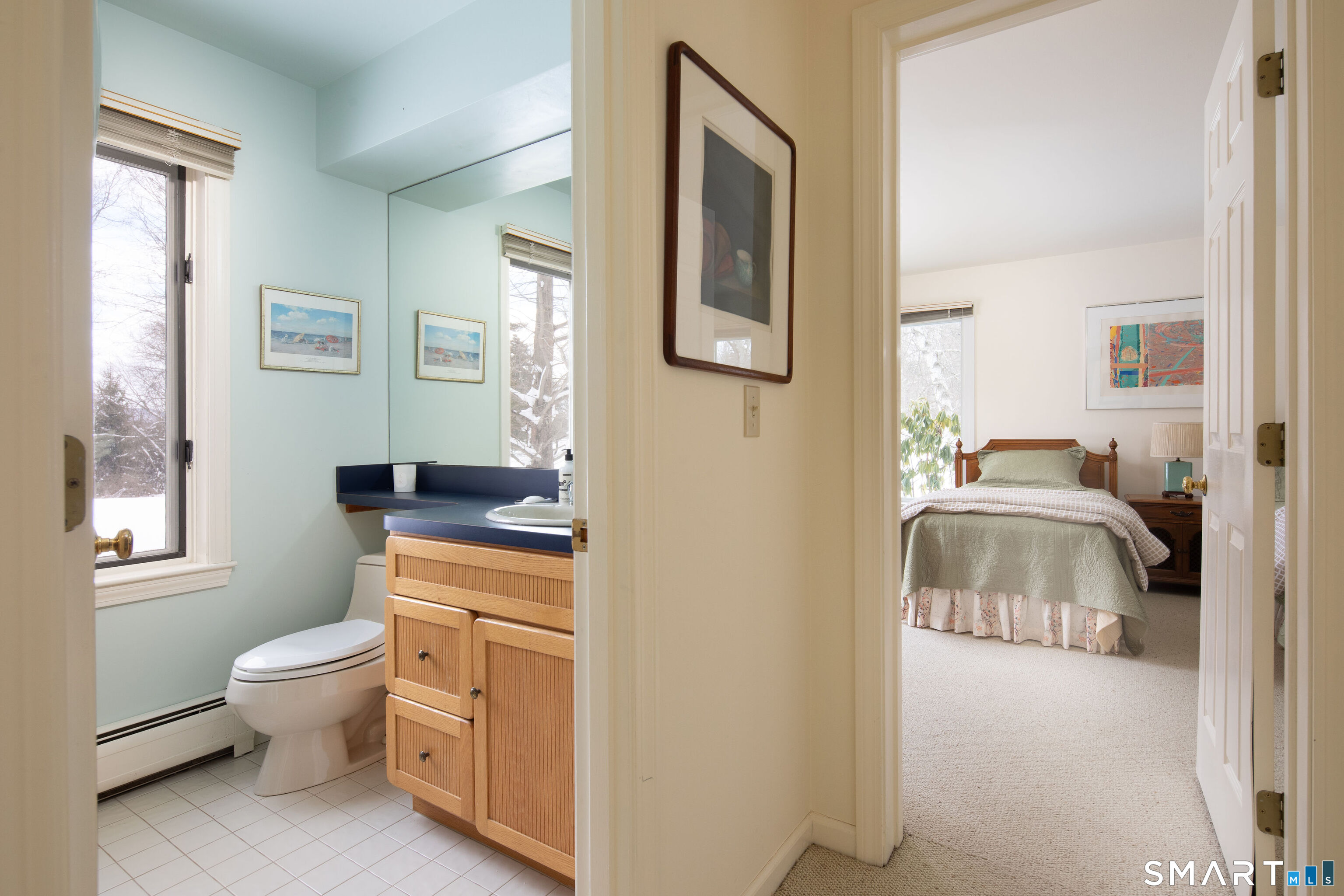 59 Cornwall Bridge Road Sharon, CT 06069 - Photo 20 of 26 a en suite bathroom with a toilet sink and mirror