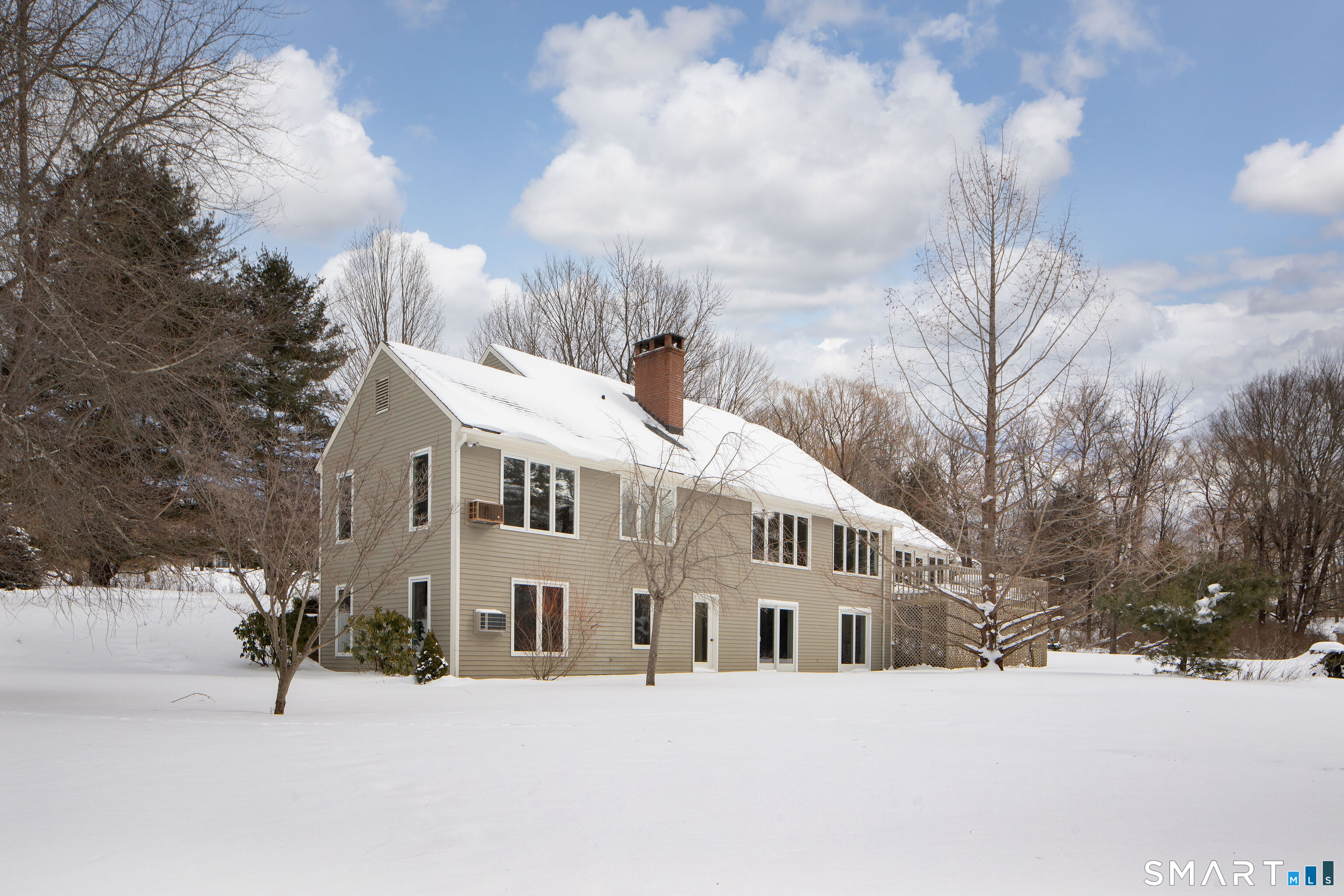 59 Cornwall Bridge Road Sharon, CT 06069 - Photo 22 of 26 a front view of a house with a yard covered in snow