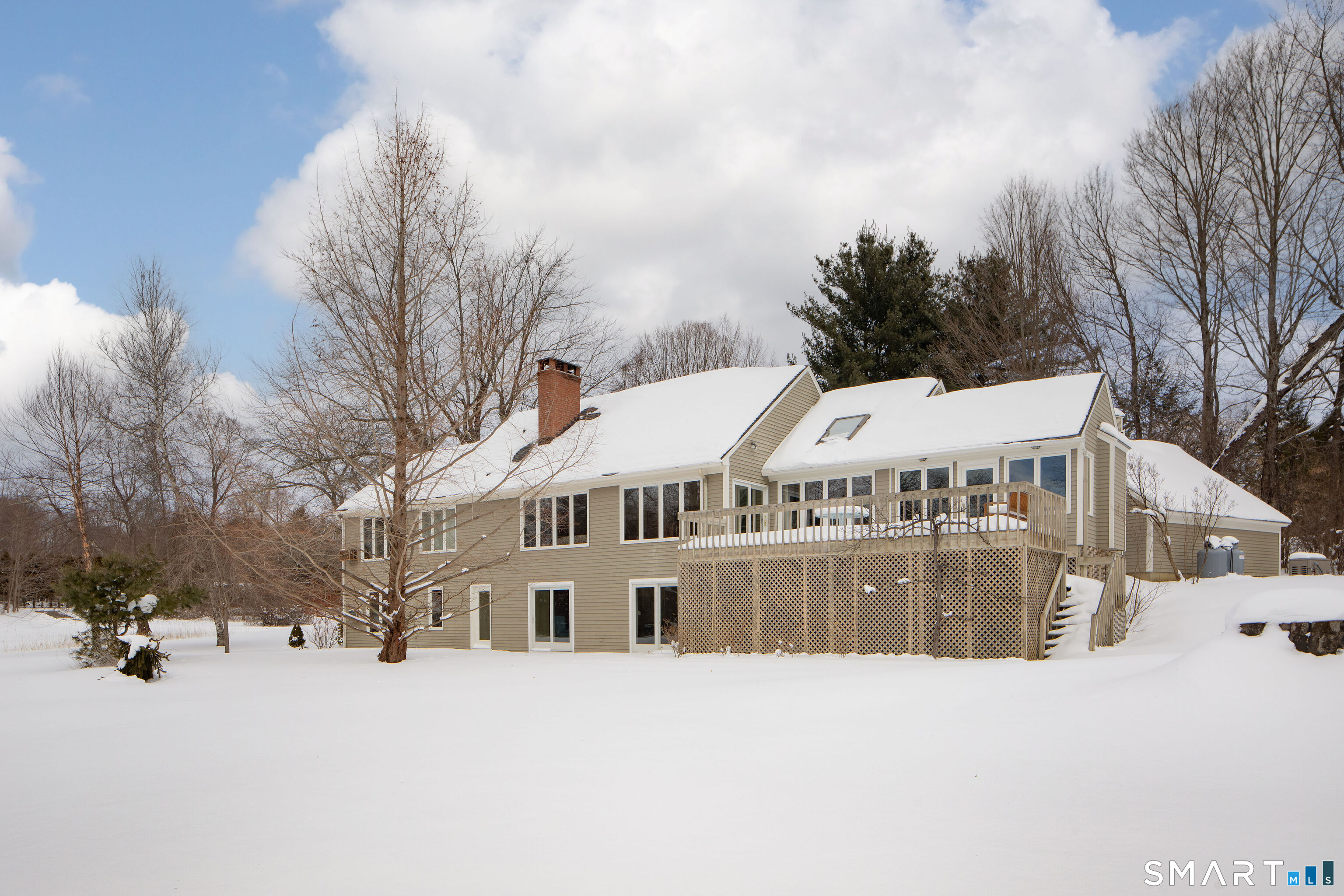 59 Cornwall Bridge Road Sharon, CT 06069 - Photo 23 of 26 a view of a building with a yard