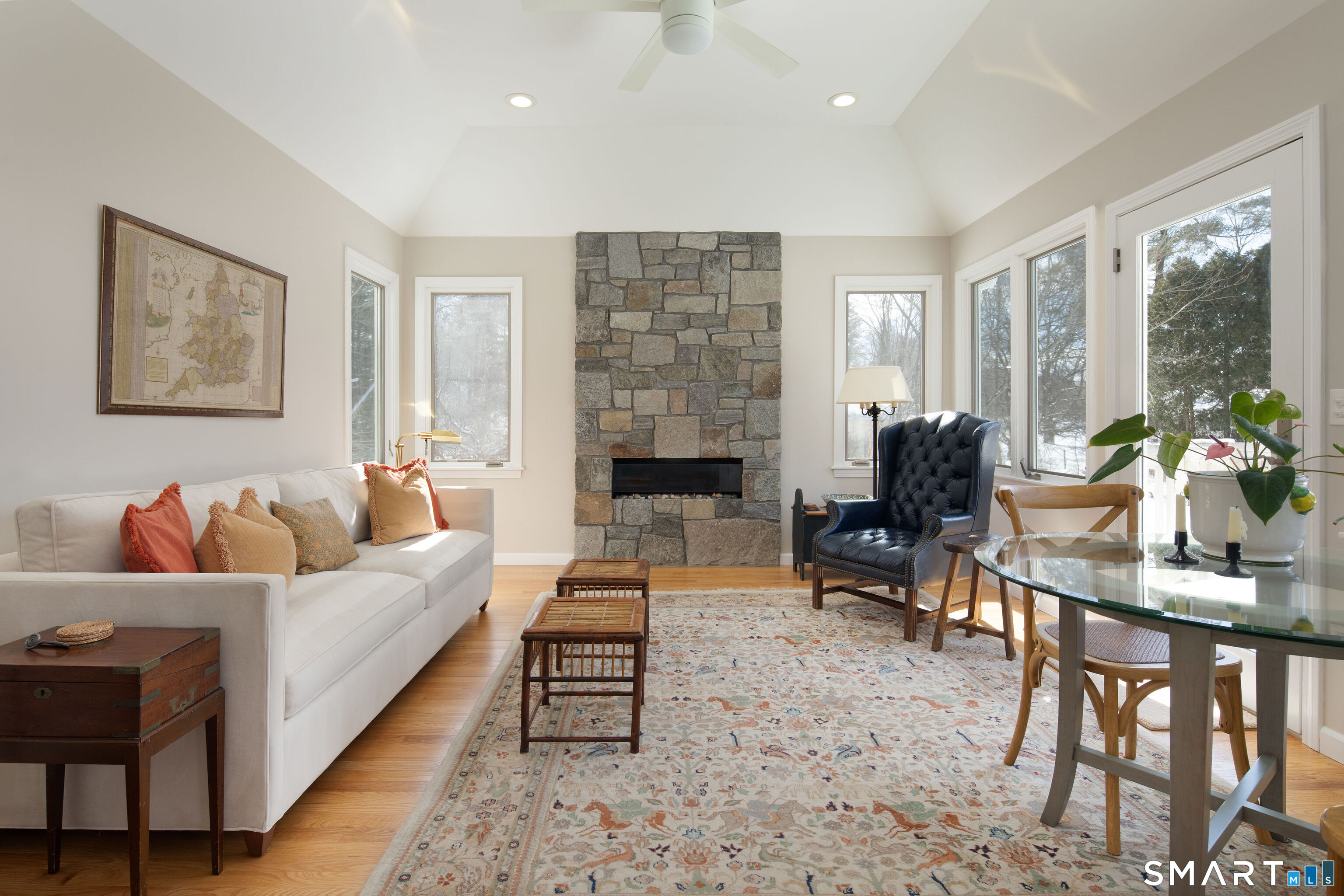 59 Cornwall Bridge Road Sharon, CT 06069 - Photo 10 of 26 a living room with furniture and a fireplace