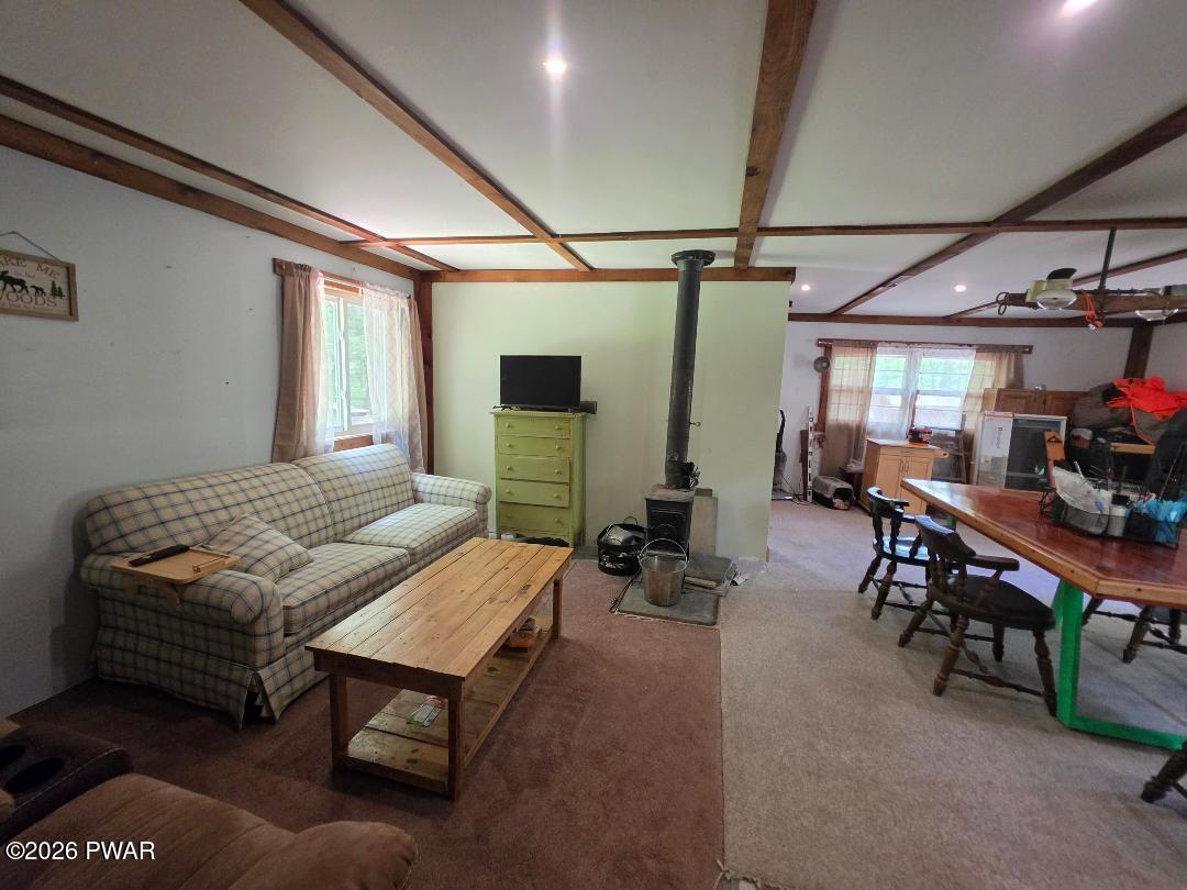 94 Swamp Road Pleasant Mount, PA 18453 - Photo 4 of 33 a bedroom with furniture and a wooden floor