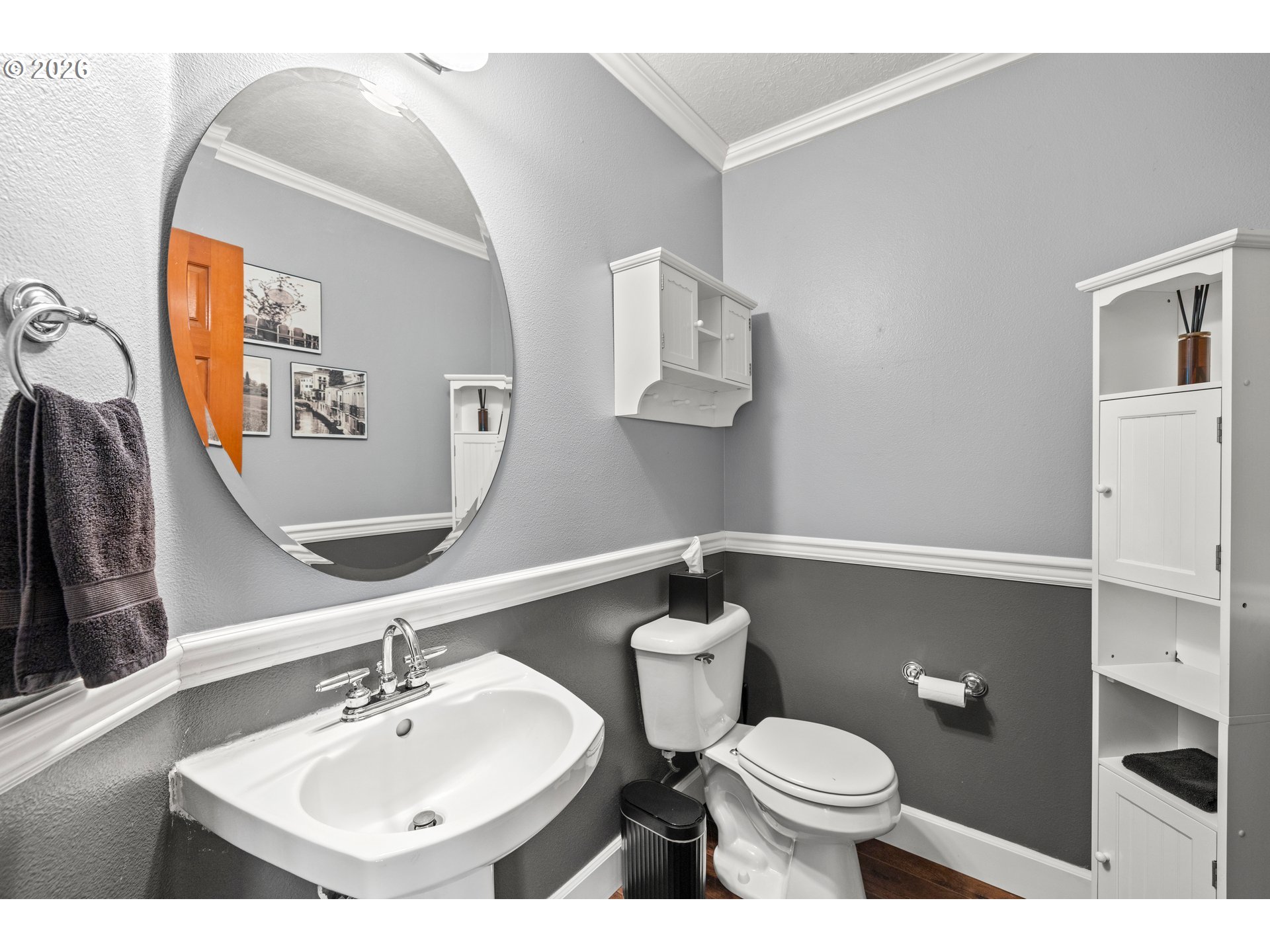 4549 Southeast 10th Terrace Gresham, OR 97080 - Photo 17 of 44 a bathroom with a toilet sink and mirror