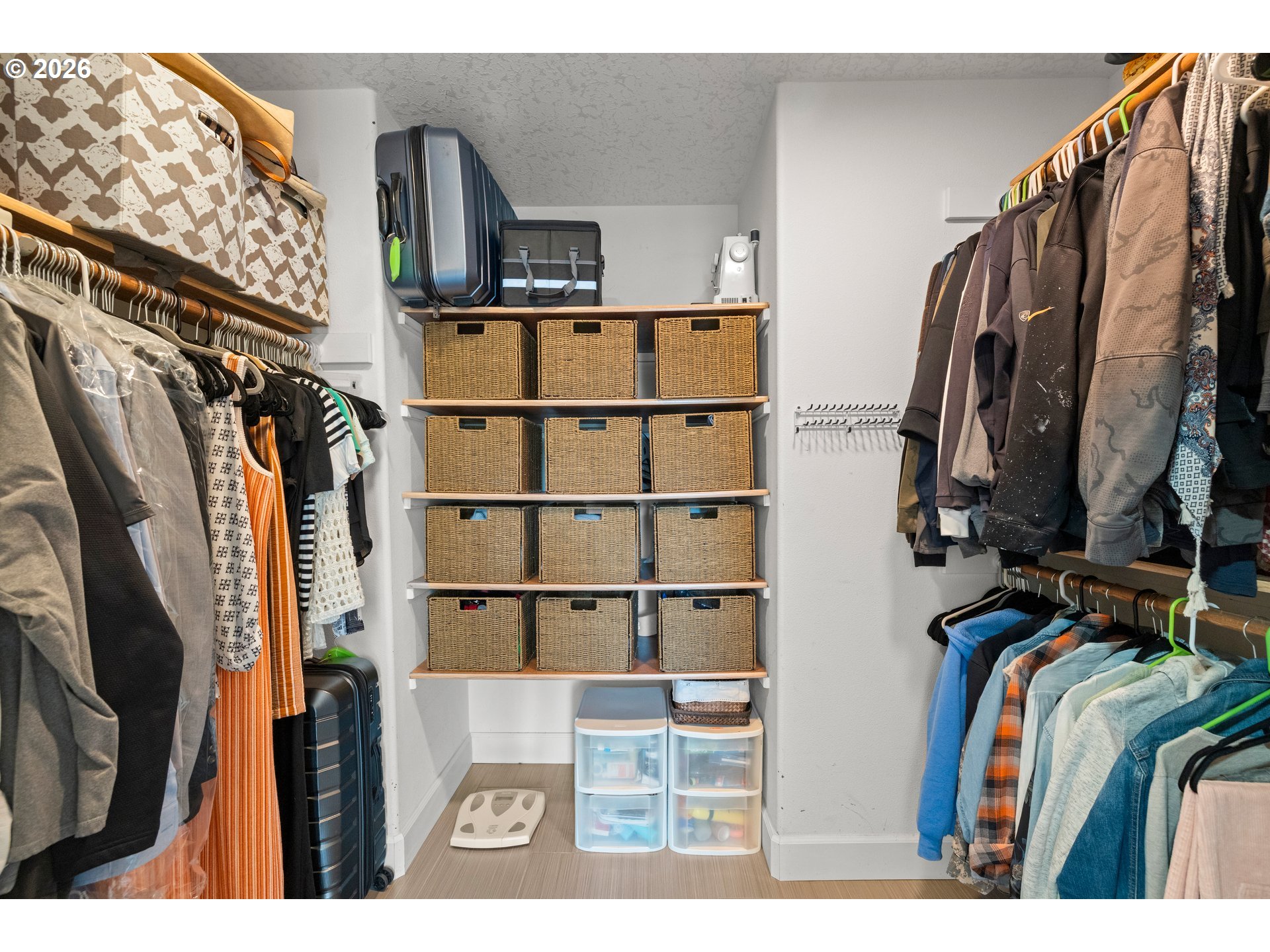 4549 Southeast 10th Terrace Gresham, OR 97080 - Photo 24 of 44 a view of walk in closet with clothes and shoes