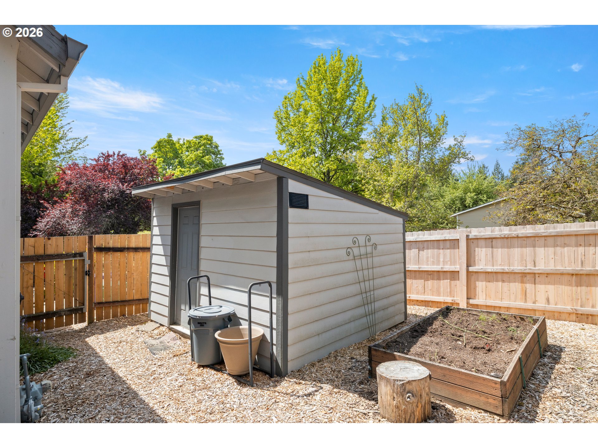 4549 Southeast 10th Terrace Gresham, OR 97080 - Photo 30 of 44 a backyard of a house with seating space