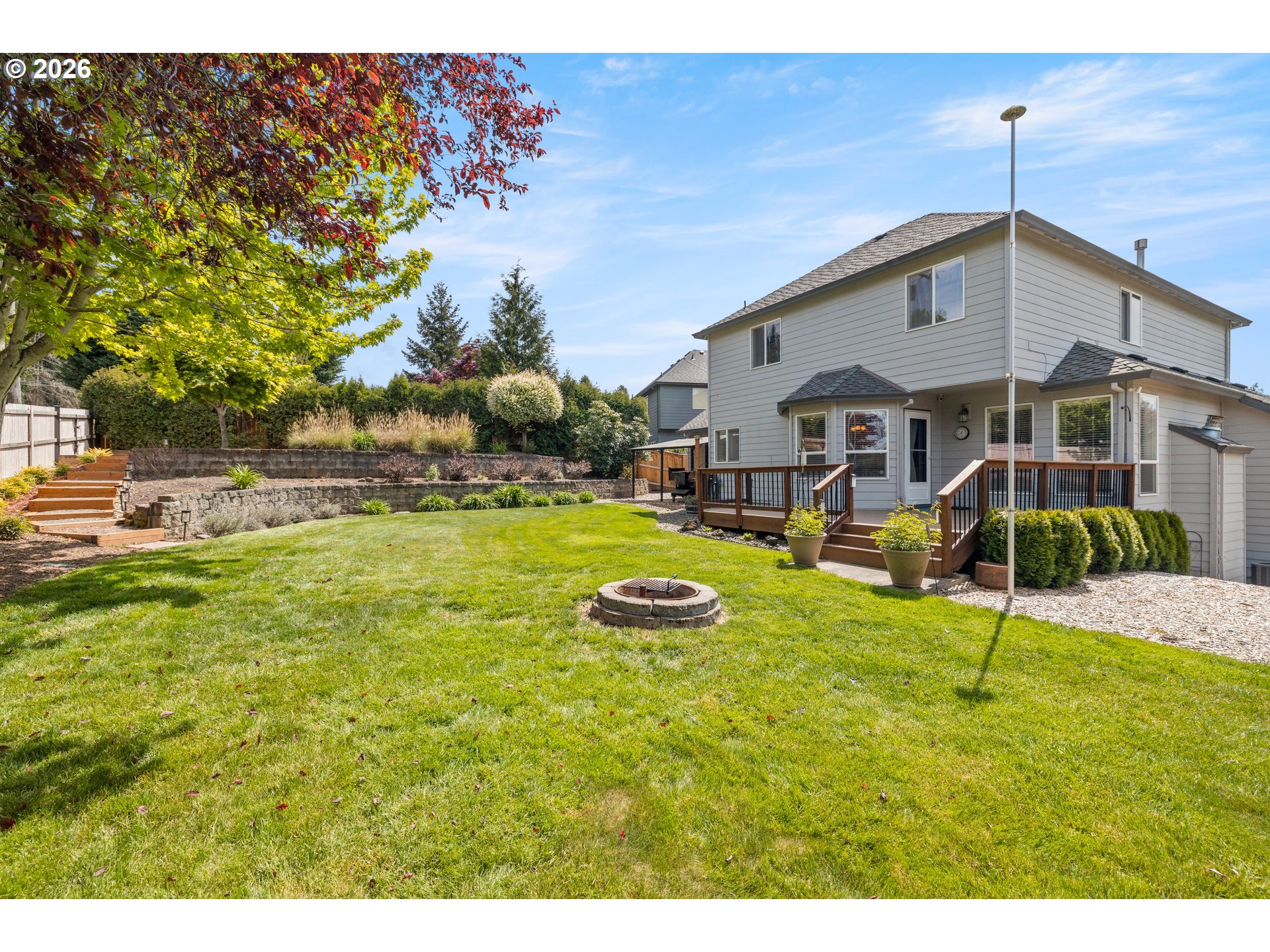 4549 Southeast 10th Terrace Gresham, OR 97080 - Photo 32 of 44 a swimming pool with yard and outdoor seating