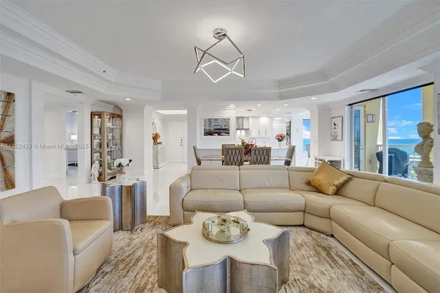 a kitchen with stainless steel appliances a stove a sink and a refrigerator