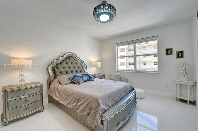 a bathroom with a double vanity sink mirror and shower