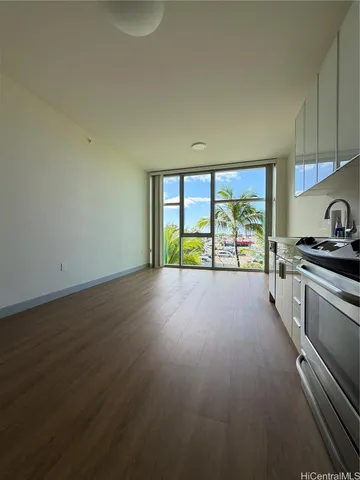 a view of a kitchen with a sink dishwasher and a fireplace