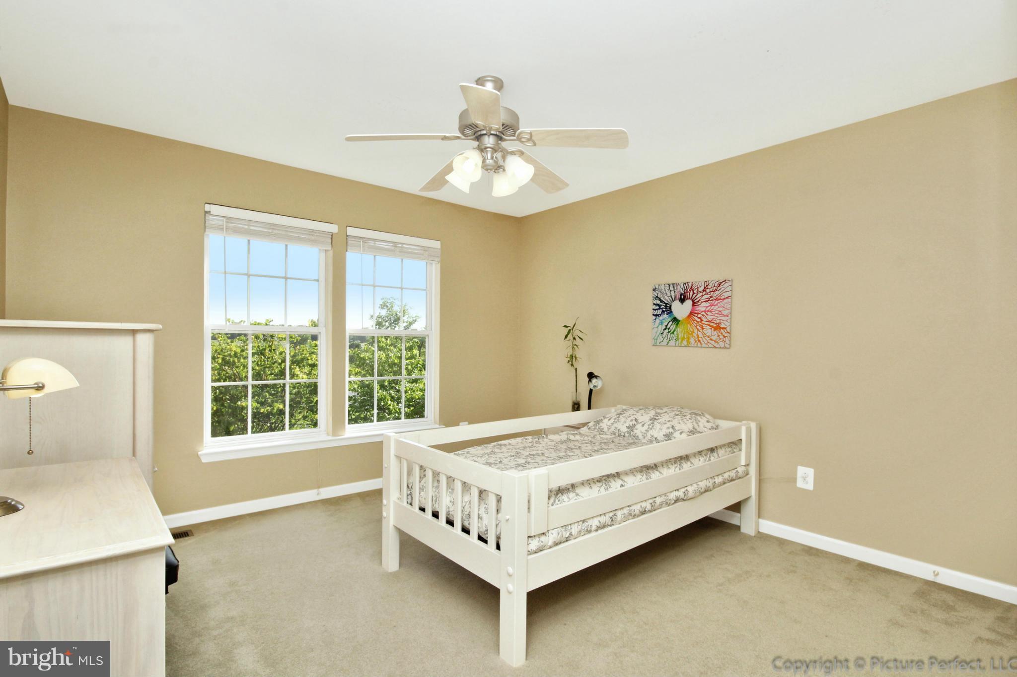 9014 Bealls Farm Road Frederick, MD 21704 - Photo 11 of 30 a bedroom with a bed and a window