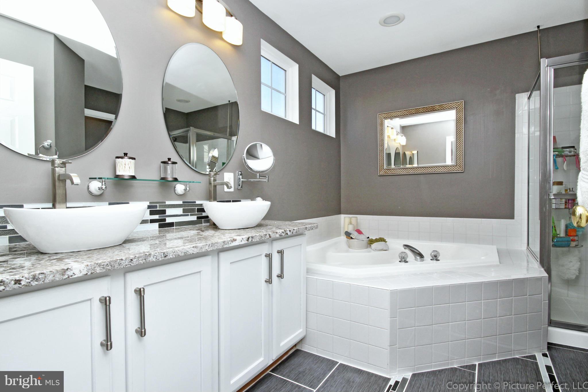 9014 Bealls Farm Road Frederick, MD 21704 - Photo 15 of 30 a bathroom with a sink and a mirror